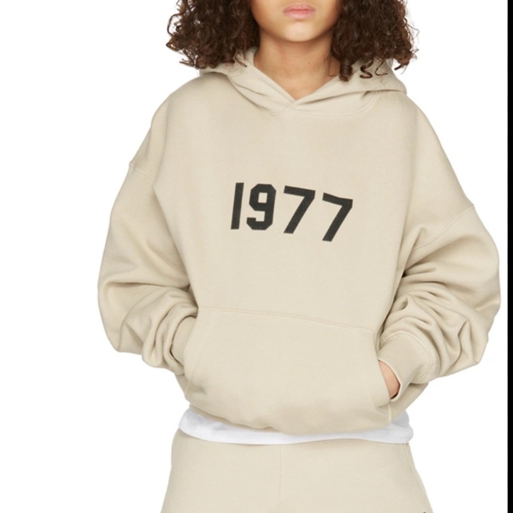 Essentials Kids Cream Hoodie with Black Print